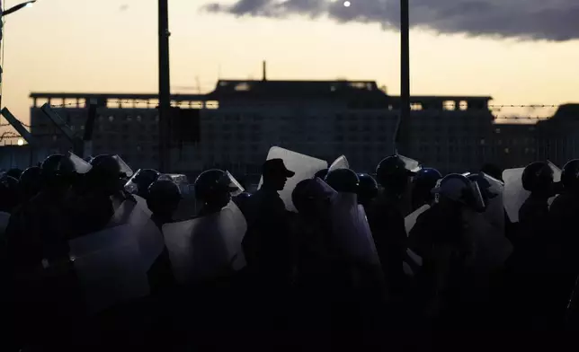 Police secure an area where former President Rodrigo Duterte is being held after his arrest in Manila, Philippines on Tuesday, March 11, 2025. (AP Photo/Aaron Favila)