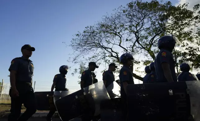Police secure an area where former President Rodrigo Duterte is being held after his arrest in Manila, Philippines, Tuesday, March 11, 2025. (AP Photo/Aaron Favila)