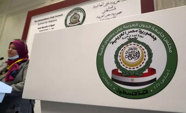 A logo in Arabic reads: "emergency Arab Summit Palestine summit" at the press center hall in Egypt's New Administrative Capital, outside Cairo, Tuesday, March 4, 2025. (AP Photo/Amr Nabil)