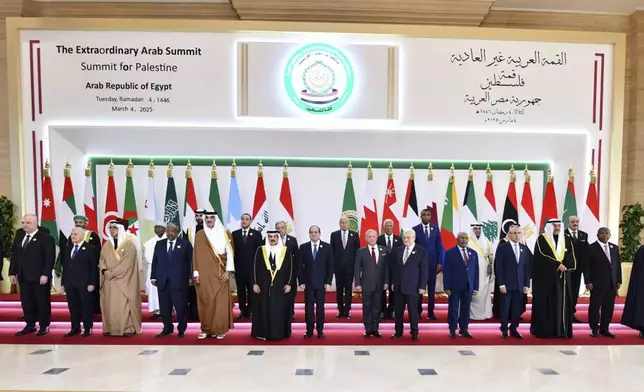 In this photo provided by Egypt's presidency media office, Arab leaders pose during the emergency Arab summit at Egypt's New Administrative Capital, just outside Cairo, Tuesday, March 4, 2025. (Egyptian Presidency Media Office via AP)