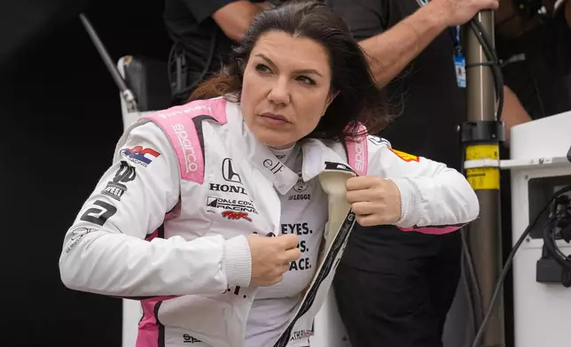 FILE - Katherine Legge, of England, prepares to drive during practice for the Indianapolis 500 auto race at Indianapolis Motor Speedway in Indianapolis, Wednesday, May 15, 2024. (AP Photo/Michael Conroy, File)
