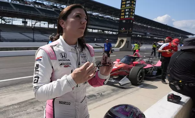 FILE - Katherine Legge, of England, looks at her time during qualifications for the Indianapolis 500 auto race at Indianapolis Motor Speedway, Sunday, May 19, 2024, in Indianapolis. (AP Photo/Darron Cummings, File)