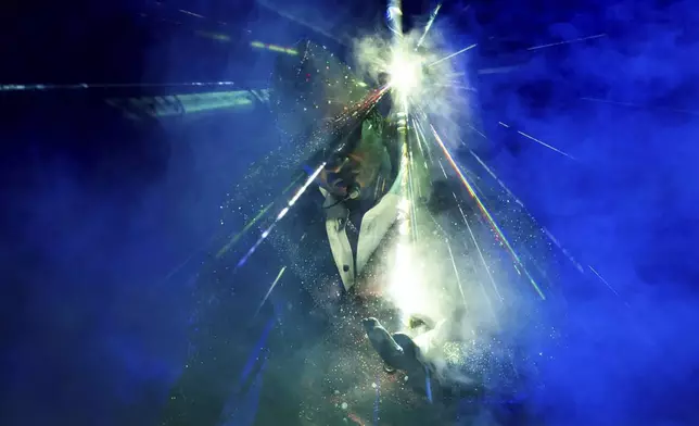 Usher performs on stage at the O2 Arena in London, Saturday, March 29, 2025. (Photo by Scott A Garfitt/Invision/AP)