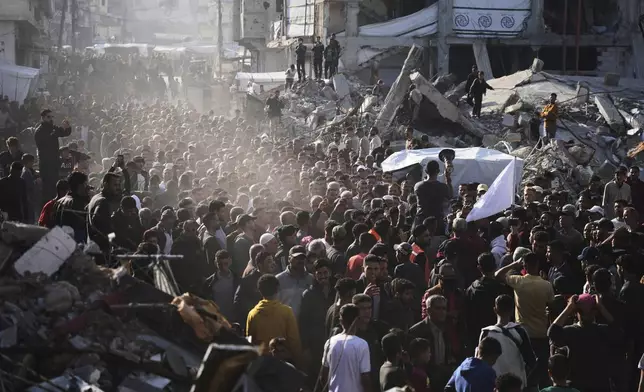 Palestinians attend an anti-war protest and against Hamas in a rare show of public anger against the militant group that rules the territory, in Beit Lahiya, northern Gaza Strip, Wednesday, March 26, 2025. (AP Photo/Jehad Alshrafi)