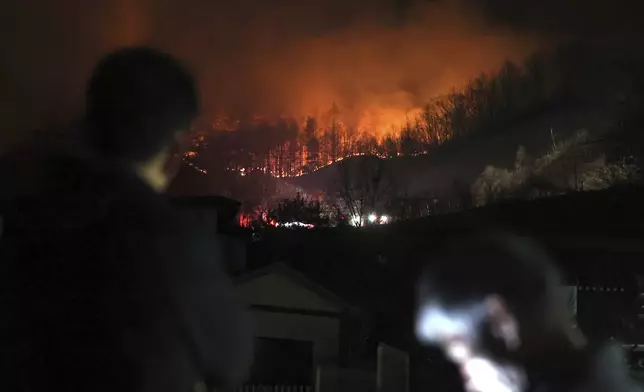 A wildfire spreads on a mountain in Sancheong, South Korea, Thursday, March 27, 2025. (Kim Dong-min/Yonhap via AP)