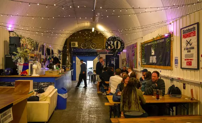 A view inside Hop Kingdom, a bar on the Bermondsey Beer Mile in south London, Saturday March 8, 2025. (AP Photo/Tony Hicks)