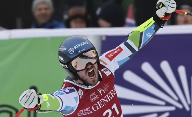 Slovenia's Miha Hrobat reacts after completing an alpine ski, men's World Cup downhill, in Kvitfjell, Norway, Saturday, March 8, 2025. (AP Photo/Marco Trovati)