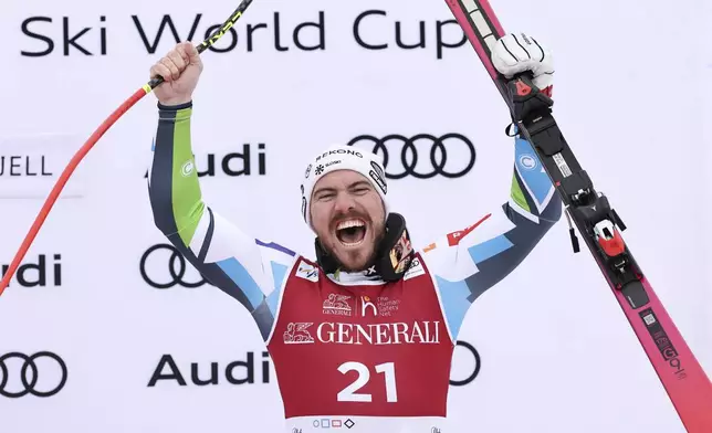 Third placed Slovenia's Miha Hrobat celebrates after an alpine ski, men's World Cup downhill, in Kvitfjell, Norway, Saturday, March 8, 2025. (AP Photo/Marco Trovati)