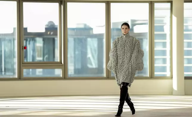 A model wears a creation as part of the Stella McCartney Fall/Winter 2025-2026 Womenswear collection presented in Paris, Wednesday, March 5, 2025. (Photo by Scott A Garfitt/Invision/AP)