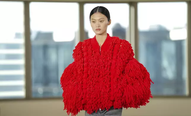 A model wears a creation as part of the Stella McCartney Fall/Winter 2025-2026 Womenswear collection presented in Paris, Wednesday, March 5, 2025. (Photo by Scott A Garfitt/Invision/AP)