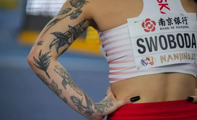 Ewa Swoboda of Poland stand after winning the women's 60 meter semifinal during the World Athletics Indoor Championships in Nanjing, China, Saturday, March 22, 2025. (AP Photo/Dar Yasin)