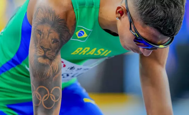 Matheus Lima prepares to compete in 400 meters men's heat during the World Athletics Indoor Championships in Nanjing, China, Friday, March 21, 2025. (AP Photo/Dar Yasin)