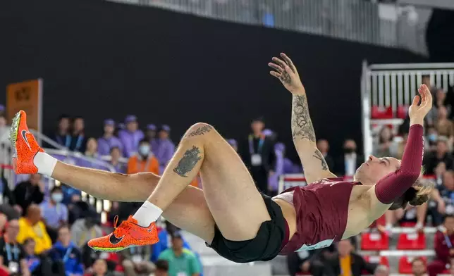 Valters Kreiss, of Latvia, makes an attempt in the men's pole vault final during the World Athletics Indoor Championships in Nanjing, China, Saturday, March 22, 2025. (AP Photo/Dar Yasin)