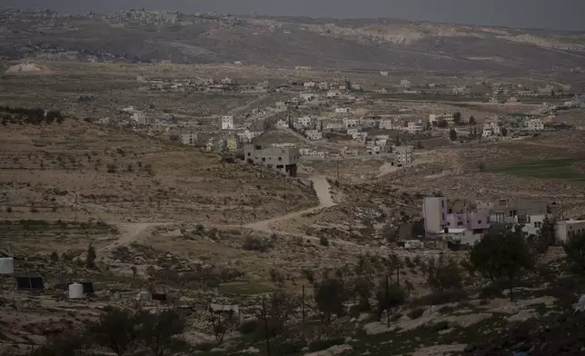 Palestinian houses are seen in the West Bank village of Tuwani, Monday, March 3, 2025. (AP Photo/Leo Correa)