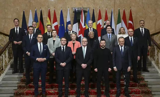 Britain's Prime Minister Keir Starmer, front center, hosts the European leaders' summit to discuss Ukraine, at Lancaster House, London, Sunday March 2, 2025. Front row from left, Finland's President Alexander Stubb, France's President Emmanuel Macron, Britain's Prime Minister Keir Starmer, Ukraine's President Volodymyr Zelenskyy and Poland's Prime Minister Donald Tusk. Center row from left, Spain's Prime Minister Pedro Sanchez, Denmark's Prime Minister Mette Frederiksen, European Commission President Ursula von der Leyen, European Council President Antonio Costa, Canada's Prime Minister Justin Trudeau, and Romania's Interim President Ilie Bolojan. Back row from left, NATO secretary General Mark Rutte, Netherlands' Prime Minister Dick Schoof, Sweden's Prime Minister Ulf Kristersson, Germany's Chancellor Olaf Scholz, Norway's Prime Minister Jonas Gahr Store, Czech Republic's Prime Minister Petr Fiala, Italy's Prime Minister Giorgia Meloni and Turkey's Minister of Foreign Affairs Hakan Fidan. (Justin Tallis/Pool via AP)