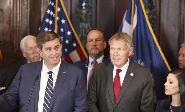 South Carolina House Speaker Murrell Smith, R-Sumter, left, speaks as state Senate Finance Committee Chairman Harvey Peeler, R-Gaffney, listens during a news conference on tax cuts on Tuesday, March 25, 2025, in Columbia, S.C. (AP Photo/Jeffrey Collins)