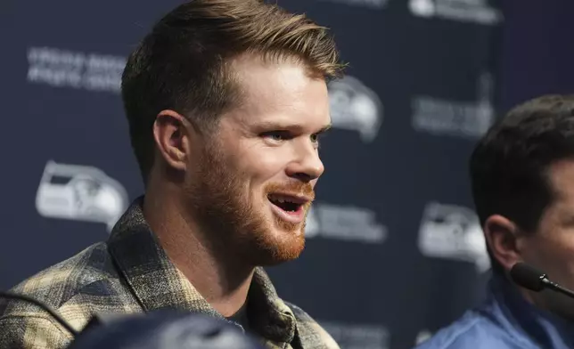 Seattle Seahawks quarterback Sam Darnold speaks during an introductory press conference Thursday, March 13, 2025, at the NFL football team's facilities in Renton, Wash. (AP Photo/Lindsey Wasson)