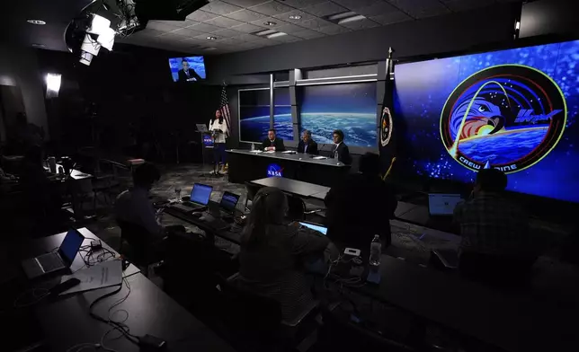 From left, Joel Montalbano, deputy associate administrator, NASA's Space Operations Mission Directorate; Steve Stich, manager, NASA's Commercial Crew Program; and Bill Spetch, operations integration manager, NASA's International Space Station Program, speak to reporters during a press conference at Johnson Space Center on Tuesday, March 18, 2025, in Houston, following the splashdown of astronauts Butch Wilmore, Suni Williams, Nick Hague, and Alexander Gorbunov. (AP Photo/Ashley Landis)