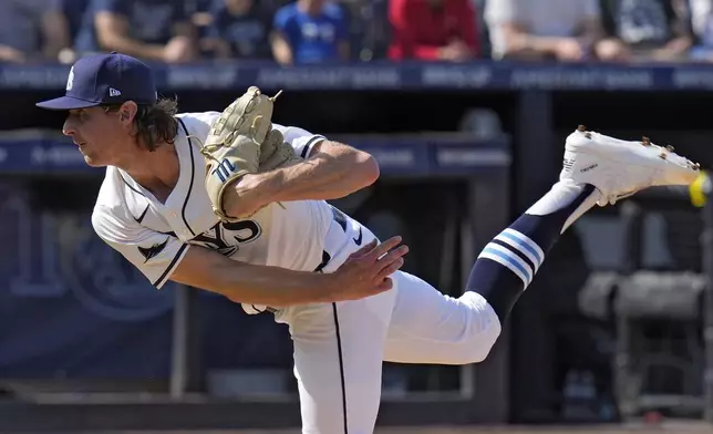 Tampa Bay Rays' Ryan Pepiot follows through on a pitch to the Colorado Rockies during the second inning of a baseball game Friday, March 28, 2025, in Tampa, Fla. (AP Photo/Chris O'Meara)