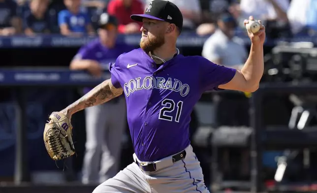 Colorado Rockies pitcher Kyle Freeland delivers to the Tampa Bay Rays during the first inning of a baseball game Friday, March 28, 2025, in Tampa, Fla. (AP Photo/Chris O'Meara)
