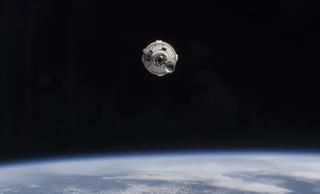 FILE - In this photo provided by NASA, the Boeing Starliner spacecraft with astronauts Butch Wilmore and Suni Williams aboard approaches the International Space Station on Thursday, June 6, 2024. (NASA via AP, File)