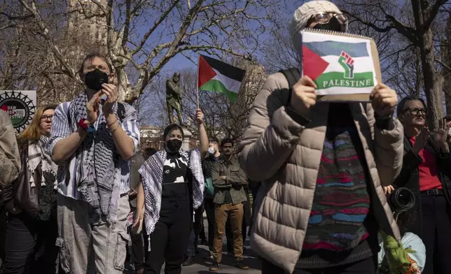A protester including students of New York University gather for a demonstration in support of Palestinian activist Mahmoud Khalil at Washington Square Park, Tuesday, March 11, 2025, in New York. (AP Photo/Yuki Iwamura)