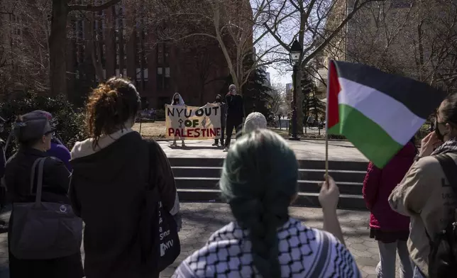 A protester including students of New York University gather for a demonstration in support of Palestinian activist Mahmoud Khalil at Washington Square Park, Tuesday, March 11, 2025, in New York. (AP Photo/Yuki Iwamura)