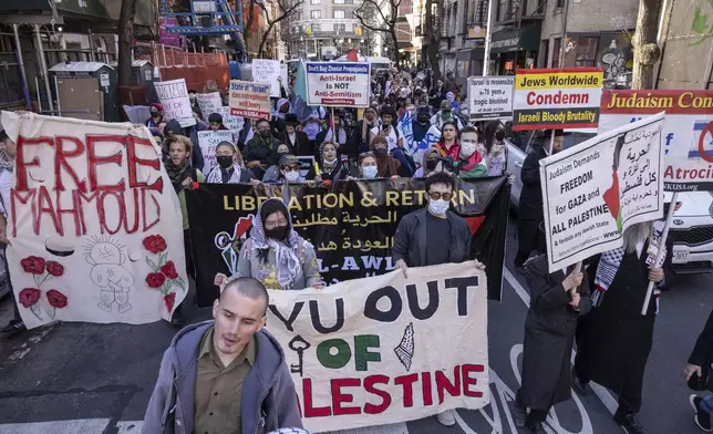 Protesters demonstrate in support of Palestinian activist Mahmoud Khalil at Washington Square Park, Tuesday, March 11, 2025, in New York. (AP Photo/Yuki Iwamura)