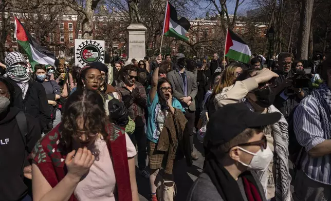 A protester including students of New York University gather for a demonstration in support of Palestinian activist Mahmoud Khalil at Washington Square Park, Tuesday, March 11, 2025, in New York. (AP Photo/Yuki Iwamura)