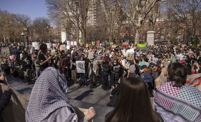 Protesters demonstrate in support of Palestinian activist Mahmoud Khalil at Washington Square Park, Tuesday, March 11, 2025, in New York. (AP Photo/Yuki Iwamura)