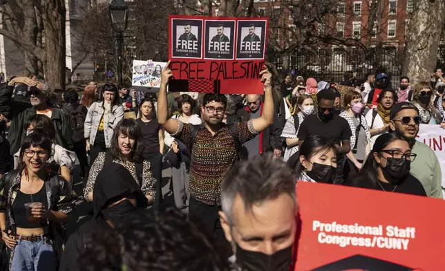 Protesters demonstrate in support of Palestinian activist Mahmoud Khalil at Washington Square Park, Tuesday, March 11, 2025, in New York. (AP Photo/Yuki Iwamura)