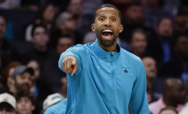 Charlotte Hornets head coach Charles Lee directs his team against the Cleveland Cavaliers during the first half of an NBA basketball game in Charlotte, N.C., Friday, March 7, 2025. (AP Photo/Nell Redmond)