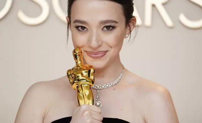 Mikey Madison, winner of the award for best performance by an actress in a leading role for "Anora," poses in the press room at the Oscars on Sunday, March 2, 2025, at the Dolby Theatre in Los Angeles. (Photo by Jordan Strauss/Invision/AP)