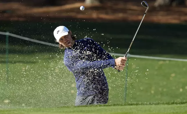 Tommy Fleetwood, of England, blasts from the sand on the 15th hole during a practice round of The Players Championship golf tournament Wednesday, March 12, 2025, in Ponte Vedra Beach, Fla. (AP Photo/Chris O'Meara)