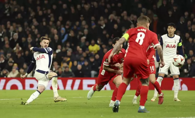 Tottenham's James Maddison scores his side's second goal during the Europa League round of 16 second leg soccer match between Tottenham Hotspur and AZ Alkmaar at the Tottenham Hotspur stadium in London, Thursday, March 13, 2025. (AP Photo/Ian Walton)