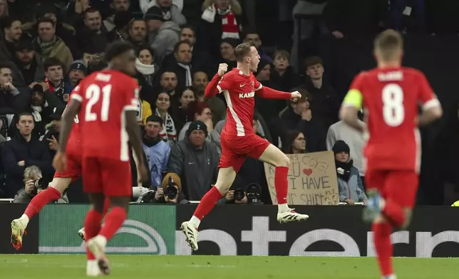 AZ Alkmaar's Peer Koopmeiners celebrates after scoring his side's first goal during the Europa League round of 16 second leg soccer match between Tottenham Hotspur and AZ Alkmaar at the Tottenham Hotspur stadium in London, Thursday, March 13, 2025. (AP Photo/Ian Walton)