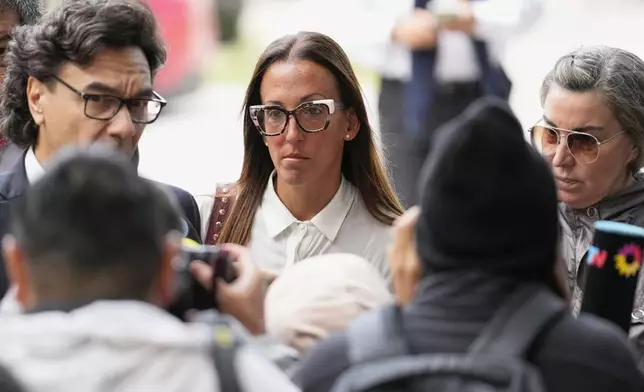 Psychiatrist Agustina Cosachov arrives for a court hearing on the trial charging the medical team that treated late soccer star Diego Maradona with homicide by negligence in San Isidro, on the outskirts of Buenos Aires, Argentina, Tuesday, March 11, 2025. (AP Photo/Natacha Pisarenko)