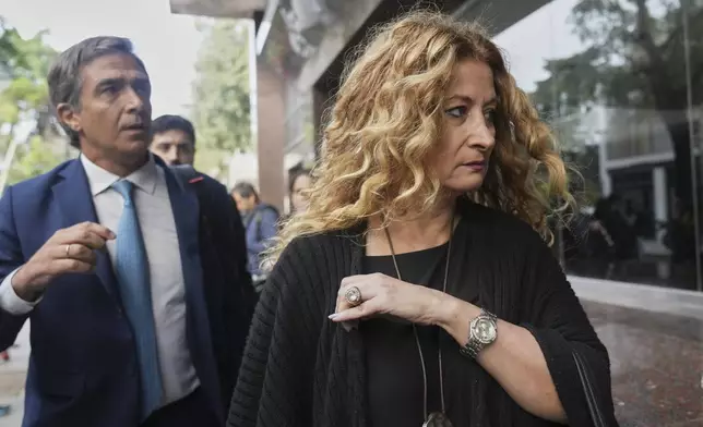 Psychiatrist Nancy Forlini arrives for a court hearing in the trial charging the medical team that treated late soccer star Diego Maradona with alleged homicide by negligence in San Isidro, on the outskirts of Buenos Aires, Argentina, Tuesday, March 11, 2025. (AP Photo/Natacha Pisarenko)