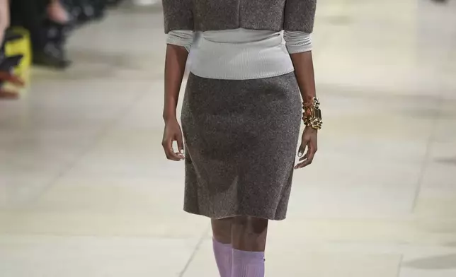 A model wears a creation as part of the Miu Miu Fall/Winter 2025-2026 Womenswear collection presented Tuesday, March 11, 2025. in Paris. (Photo by Scott A Garfitt/Invision/AP)