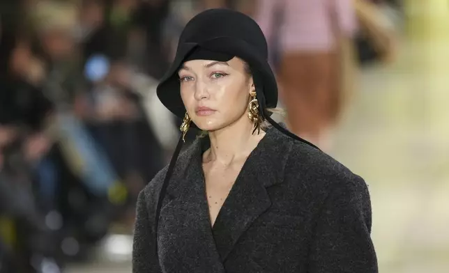 Gigi Hadid wears a creation as part of the Miu Miu Fall/Winter 2025-2026 Womenswear collection presented Tuesday, March 11, 2025. in Paris. (Photo by Scott A Garfitt/Invision/AP)