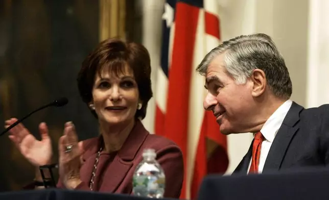 FILE - Former Massachusetts Gov. Michael Dukakis and his wife, Kitty, appear onstage prior to reading letters between John Adams and his wife, Abigail, during a Massachusetts Historical Society program at Faneuil Hall in Boston Monday, Nov. 19, 2007. AP Photo/Elise Amendola, File)