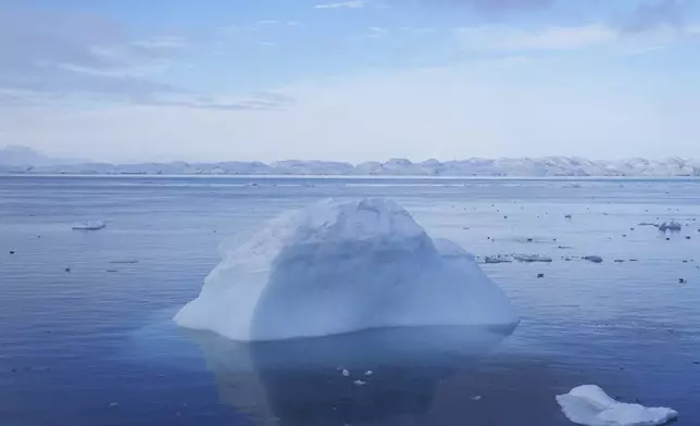 A piece of ice floats on the sea in Nuuk, Greenland, Tuesday, March 4, 2025. (AP Photo/Evgeniy Maloletka)