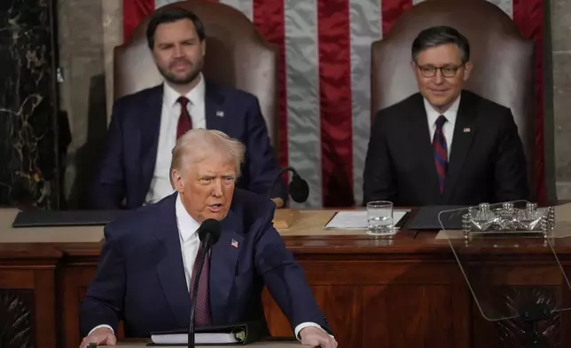 President Donald Trump talks about Greenland as he addresses a joint session of Congress in the House chamber at the U.S. Capitol in Washington, Tuesday, March 4, 2025, as Vice President JD Vance and House Speaker Mike Johnson of La., listen. (AP Photo/Julia Demaree Nikhinson)
