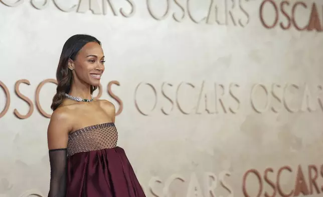 Zoe Saldana arrives at the Oscars on Sunday, March 2, 2025, at the Dolby Theatre in Los Angeles. (AP Photo/Jae C. Hong)