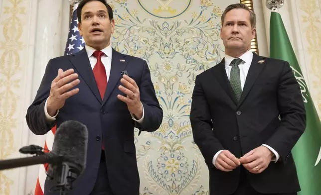 U.S. Secretary of State Marco Rubio, left, and U.S. National Security Advisor Mike Waltz speak with the media following meetings with a Ukrainian delegation in Jeddah, Saudi Arabia, March 11, 2025. (Saul Loeb/Pool Photo via AP)