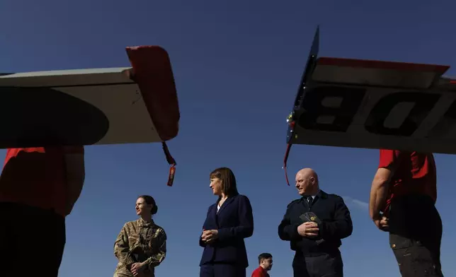 Britain's Chancellor of the Exchequer Rachel Reeves looks on during a visit to RAF Northolt to meet with UK defence suppliers to Ukraine, in North West London, Thursday March 6, 2025. (Dan Kitwood/PA via AP)