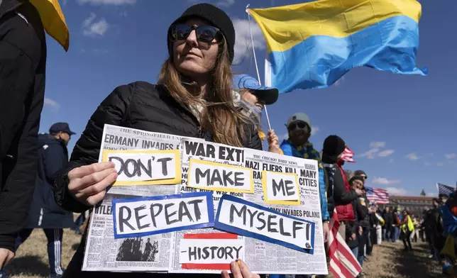Demonstrators protest during a rally in support of Ukraine at The Ellipse near the White House in Washington, Saturday, March 8, 2025. (AP Photo/Jose Luis Magana)