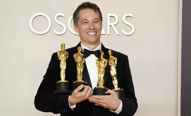 Sean Baker, winner of the awards for best original screenplay, best film editing, best director, and best picture for "Anora," poses in the press room at the Oscars on Sunday, March 2, 2025, at the Dolby Theatre in Los Angeles. (Photo by Jordan Strauss/Invision/AP) poses in the press room at the Oscars on Sunday, March 2, 2025, at the Dolby Theatre in Los Angeles. (Photo by Jordan Strauss/Invision/AP)