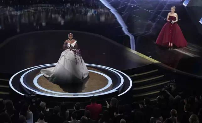 Cynthia Erivo, left, and Ariana Grande perform "Defying Gravity" during the Oscars on Sunday, March 2, 2025, at the Dolby Theatre in Los Angeles. (AP Photo/Chris Pizzello)