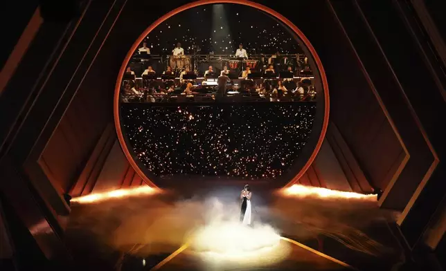 Raye sings "Skyfall" during the Oscars on Sunday, March 2, 2025, at the Dolby Theatre in Los Angeles. (AP Photo/Chris Pizzello)